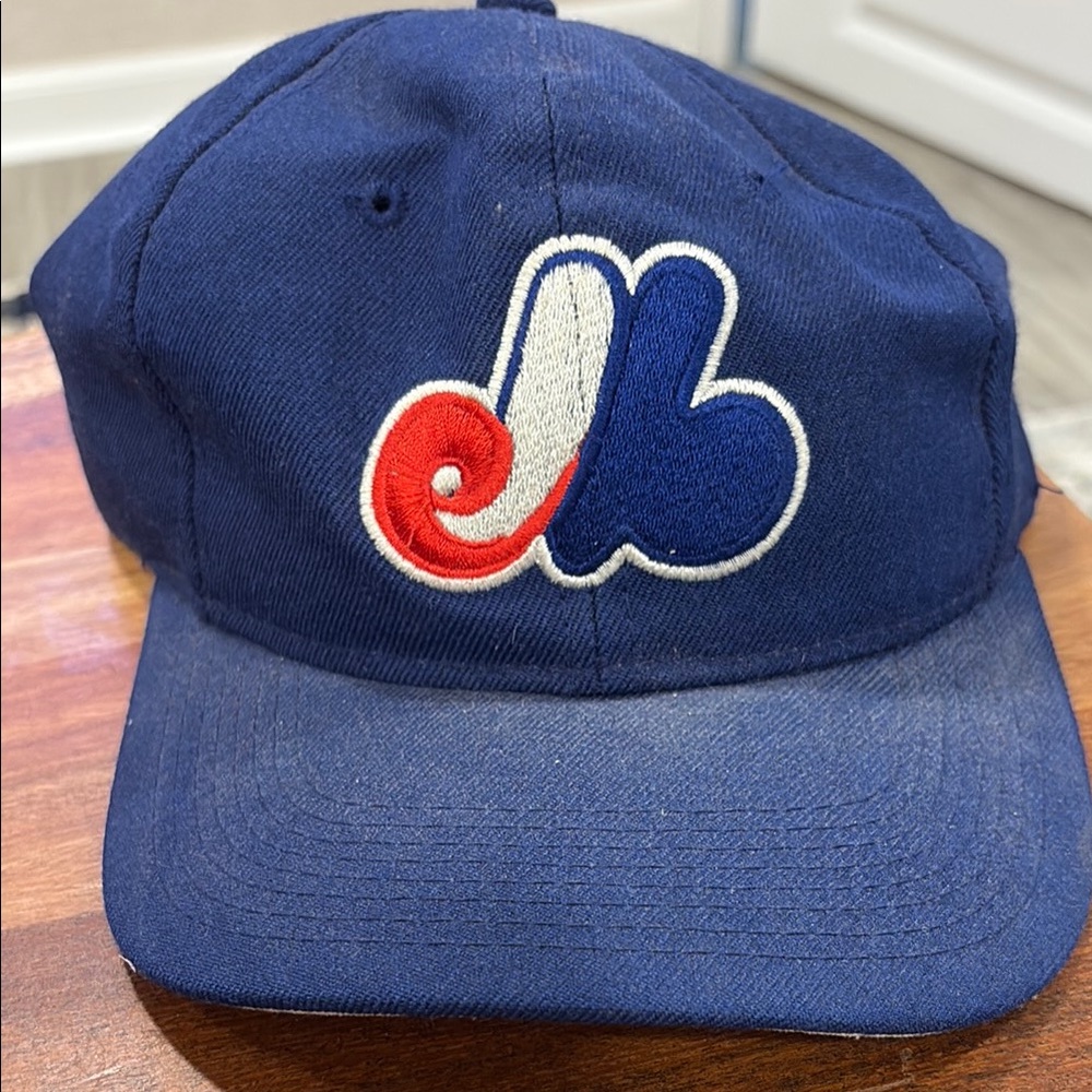 Blue Baseball Cap with Red and White Logo